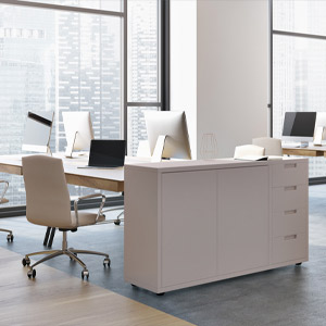 A sleek modern office featuring organized desks and ergonomic chairs in a bright, open workspace.
